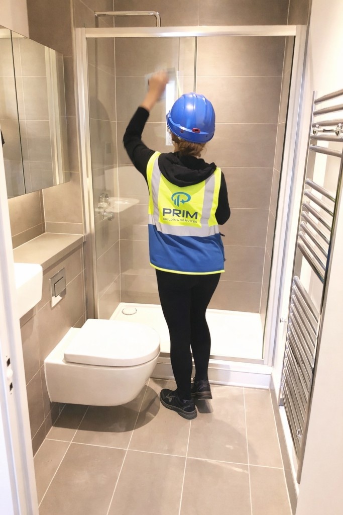 Cleaning a window indoors